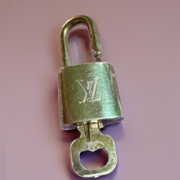 Louis Vuitton GOLD Lock & Key Gold tone Authentic. Number 304 MSRP $300 - Picture 4 of 7